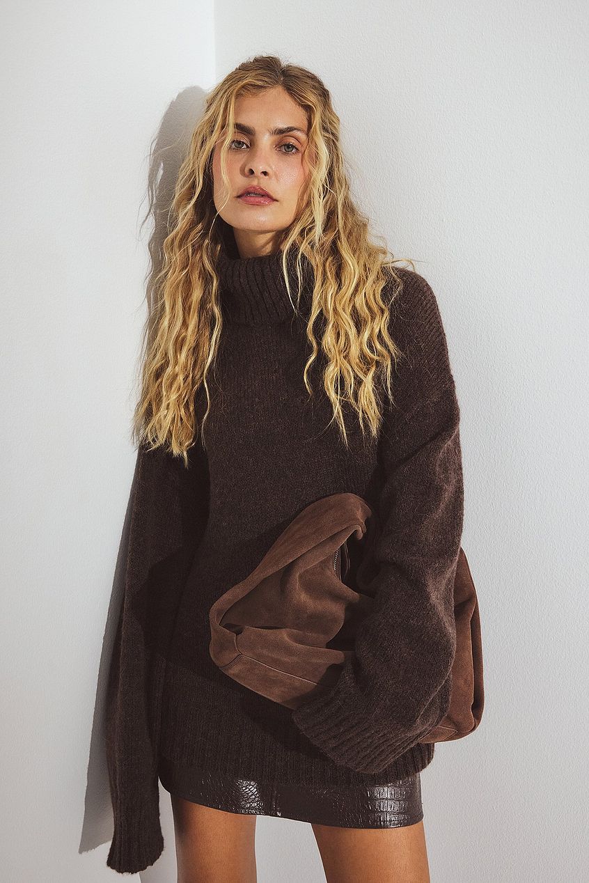 Stickad tröja i ullmix med polokrage.